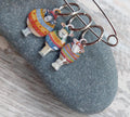 One Striped Sheep Stitch Marker by Emma Bal